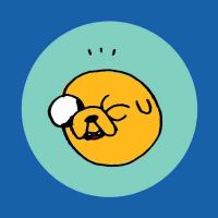 Jake from Adventure Time smiling and winking with his left eye